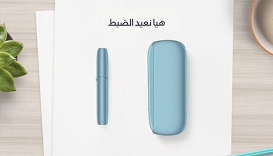 أنبوب تسخين وشاحن جيب جهاز IQOS Originals DUO بلون التركواز.