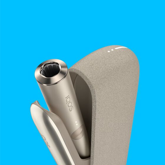 An IQOS ILUMA holder inside a charger.