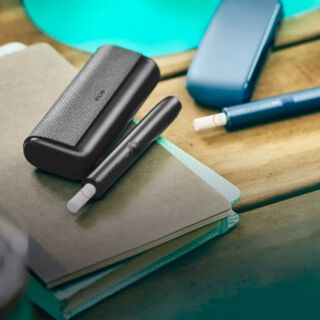 A pink and a blue IQOS