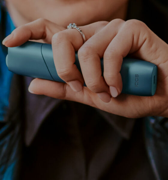 IQOS Originals Duo holder and pocket charger in red color.