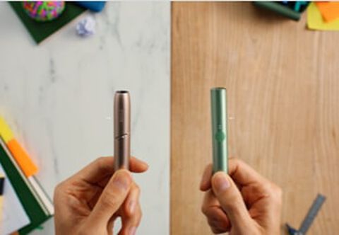 An IQOS ORIGINALS DUO Holder and an IQOS ILUMA Holder.