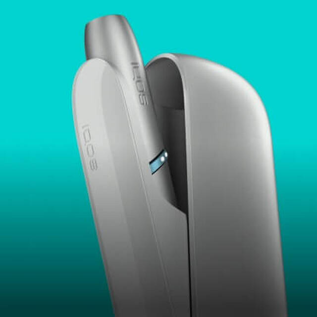 Silver IQOS Originals Duo heated tobacco holder and pocket charger.